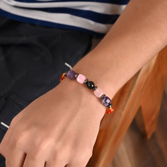 Elegant thread featuring Rose Quartz, Amethyst, and Obsidian for heart-centered connection