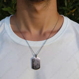 Protective silver pendant with embedded Hanuman Chalisa scripture