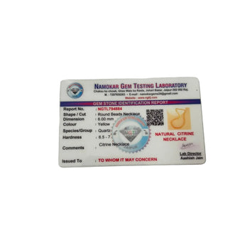 Gem Testing Laboratory identification card for citrine necklace on a white background