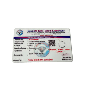 Gem Testing Laboratory certification for a natural black spinel anklet on a white background