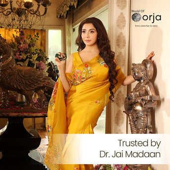 Dr. Jai madaan in a yellow wearing World of oorja Green Aventurine Mala