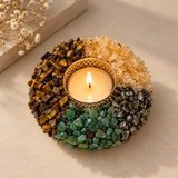 Dhan Yog tea light holder with a lit candle, top view