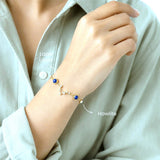 Wearing the Libra constellation bracelet – gold