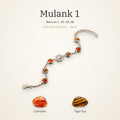 Mulank 1 Sun Charm Bracelet – Carnelian & Tiger Eye – Mulank 1 Sun charm bracelet on a plain background