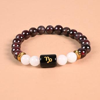 Capricorn zodiac bracelet with Capricorn glyph engraved onyx bead