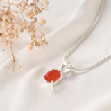 Carnelian pendant Prong setting angled view showing facets