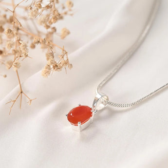 Carnelian pendant Prong setting angled view showing facets