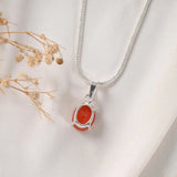 Carnelian pendant Prong setting rear view showing silver claws