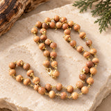 Gold Plated Devadaru Mala – natural Himalayan deodar wood beads with gold-plated caps
