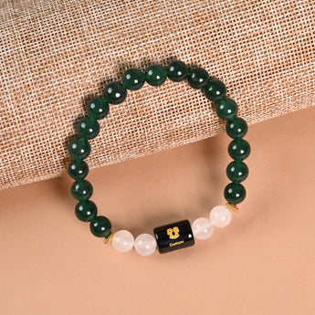 Gemini Green Aventurine and Milky Quartz zodiac bracelet flat lay