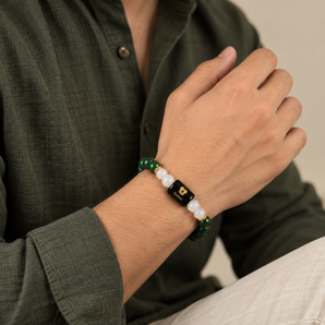 Gemini zodiac bracelet in Green Aventurine and Milky Quartz worn on the wrist