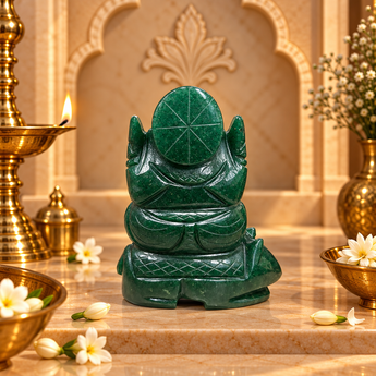 Rear view of the Jade Ganesh Ji murti showing the carved crown detail