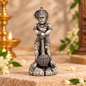 Silver plated Hanuman idol resting on gada