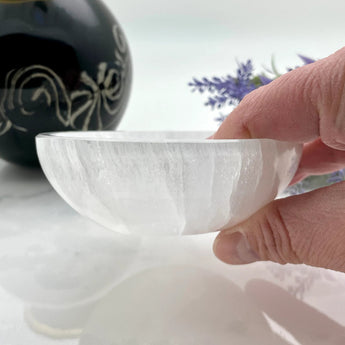 Selenite crystal bowl for cleansing stones and spiritual healing rituals