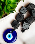 Black Tourmaline Cubes with Evil Eye Hanging Charm