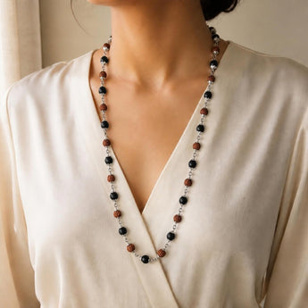 Rudraksha Karungali Mala worn by a woman