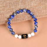 Libra Lapis Lazuli and Howlite zodiac bracelet flat lay