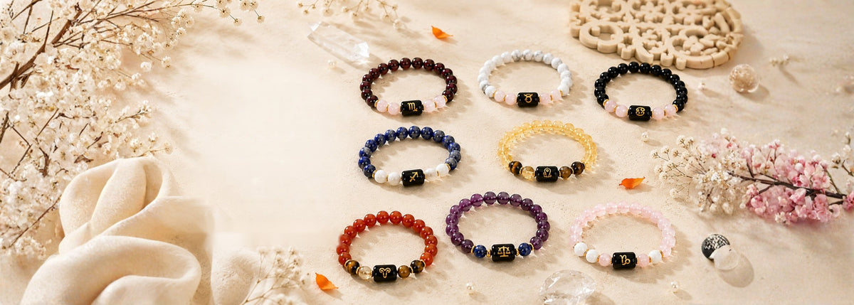 Eight zodiac crystal bracelets with gold-engraved sign beads in garnet, howlite, onyx, lapis lazuli, citrine, carnelian, amethyst and rose quartz