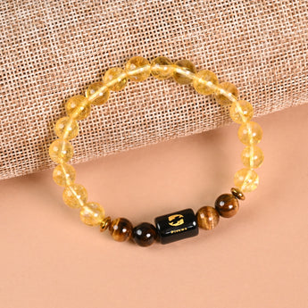 Pisces Citrine and Tiger's Eye zodiac bracelet flat lay