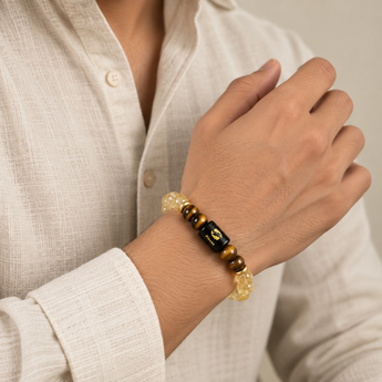 Pisces zodiac bracelet in Citrine and Tiger's Eye worn on the wrist