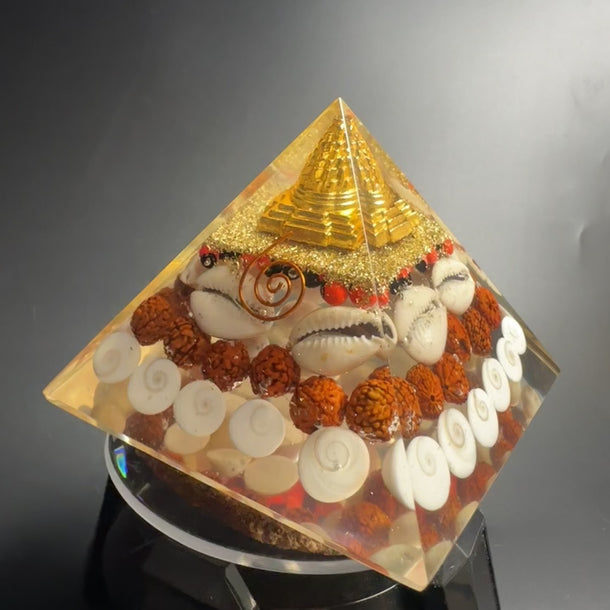 Video of Handmade Shree Yantra Gomti Chakra Pyramid with Rudraksha and Kauri