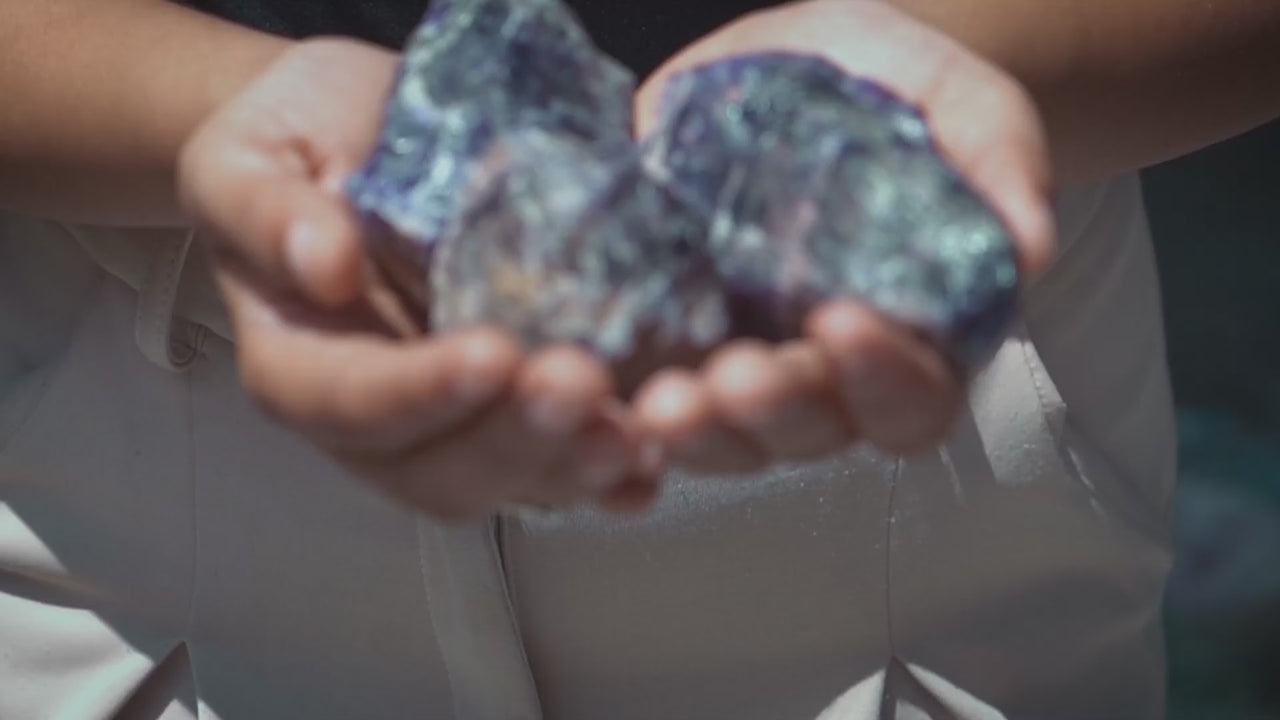 video of how raw crystals are cut polished and crafted into beaded bracelets