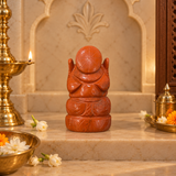 Rear view of the Red Jasper Ganesh Ji murti showing the carved crown detail