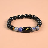 Sagittarius zodiac bracelet with Sagittarius glyph engraved onyx bead