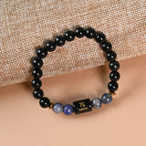 Sagittarius Black Obsidian and Lapis Lazuli zodiac bracelet flat lay