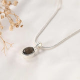 Smoky Quartz Pendant by World of Oorja – natural smoky quartz stone in a silver bezel setting on a fine chain, worn for grounding and protection