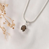 Prong-set Smoky Quartz pendant – faceted smoky quartz held in four silver prongs on a fine chain, World of Oorja