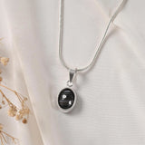 Sulemani Hakik pendant Classic setting — faceted stone catching light