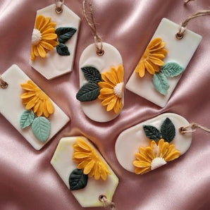 Handmade sunflower vanilla scented wax sachets with jute hanging strings in assorted shapes