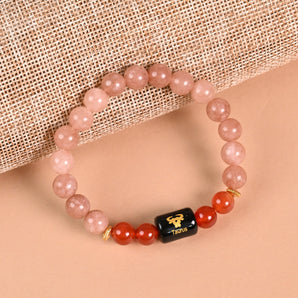 Taurus zodiac bracelet in Sunstone and Carnelian with engraved black onyx Taurus bead